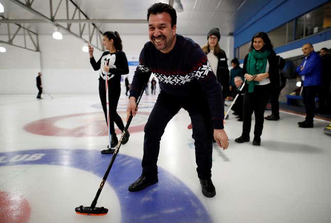 A refugee from Afghanistan smiles. (Reuters/Mark Blinch)