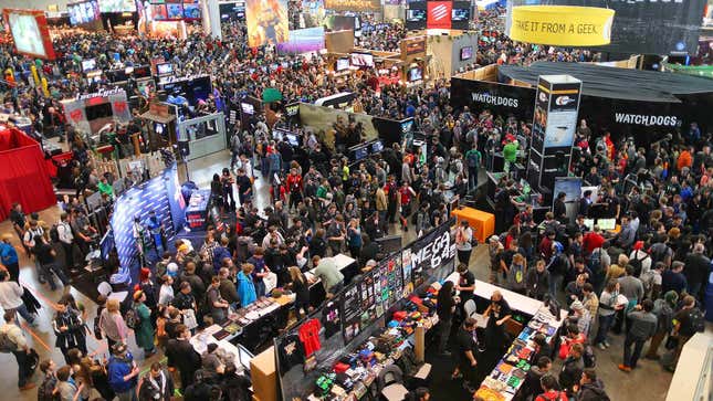 A large group of people milling about on the show floor of PAX East 2013