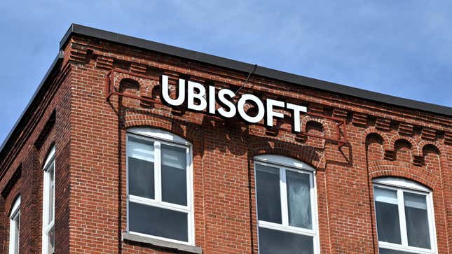 The façade of the Ubisoft Montreal offices featuring the company logo against a brick wall.