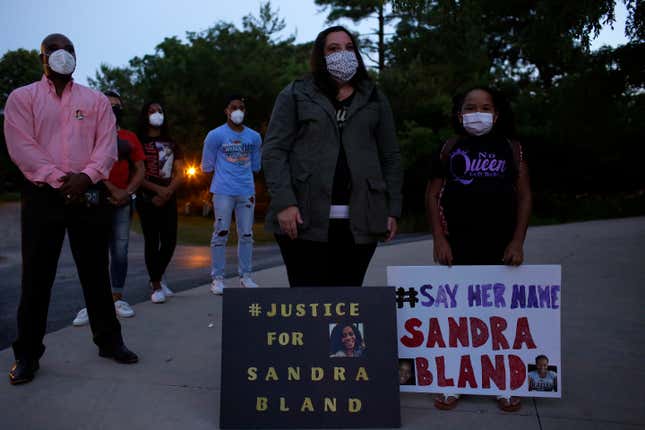 NAPERVILLE, IL - JULY 13: People attend a candlelight vigil to honor the life of Sandra Bland at Centennial Park on July 13, 2020 in Naperville, Illinois. Bland was found dead in her cell at the Waller County Jail in Hempstead, Texas after a controversial traffic stop by Texas State Trooper Brian Encinia in 2015. 