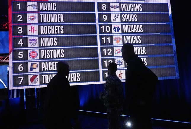 May 17, 2022;  Chicago, IL, USA;  People look at the draft lottery order following the 2022 NBA Draft Lottery at McCormick Place.