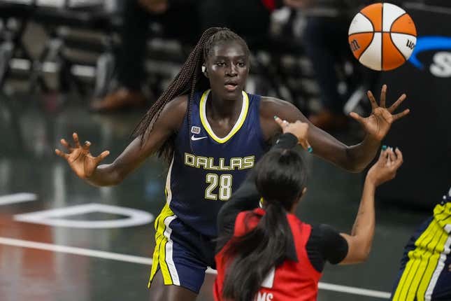 May 27, 2021; College Park, Georgia, USA; Dallas Wings center Awak Kuier (28) defends against the Atlanta Dream during the second half at Gateway Center Arena at College Park.