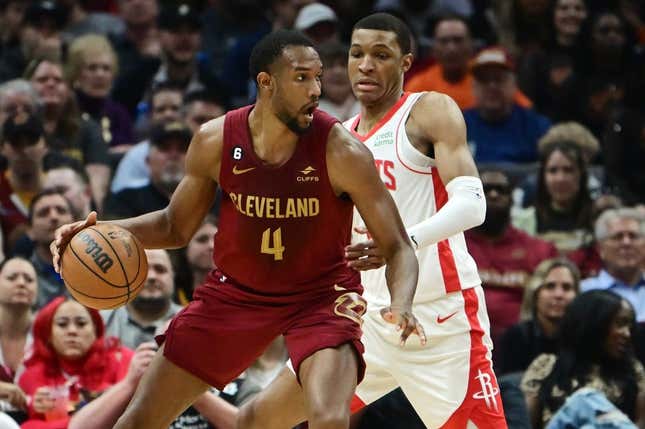 Mar 26, 2023; Cleveland, Ohio, USA; Houston Rockets forward Jabari Smith Jr. (1) defends against Cleveland Cavaliers forward Evan Mobley (4) during the first half at Rocket Mortgage FieldHouse.