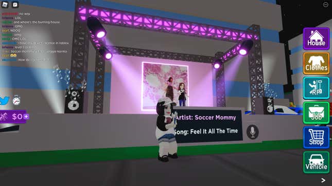 A Roblox character wearing a hat stands in front of a pink stage.
