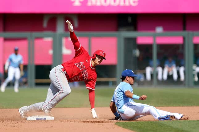Jun 17, 2023; Kansas City, Missouri, USA; Los Angeles Angels designated hitter Shohei Ohtani (17) reacts to being tagged out by Kansas City Royals second baseman Nicky Lopez (8) during the fourth inning at Kauffman Stadium.