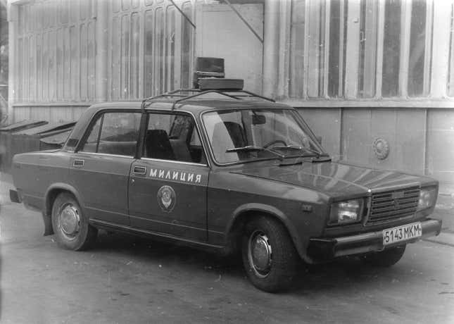 A black and white photo of a VAZ-2101 Police Car