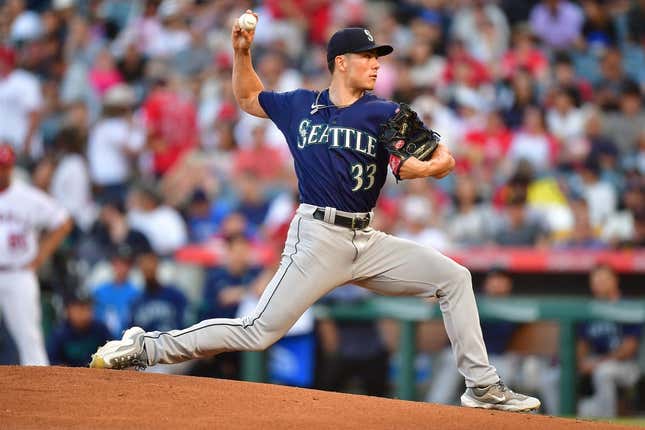 August 3, 2023; Anaheim, California, USA; Seattle Mariners starting pitcher Bryan Woo (33) throws against the Los Angeles Angels during the first inning at Angel Stadium.