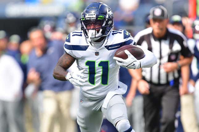 Oct 23, 2022; Inglewood, California, USA; Seattle Seahawks wide receiver Marquise Goodwin (11) runs the ball against the Los Angeles Chargers during the first half at SoFi Stadium.