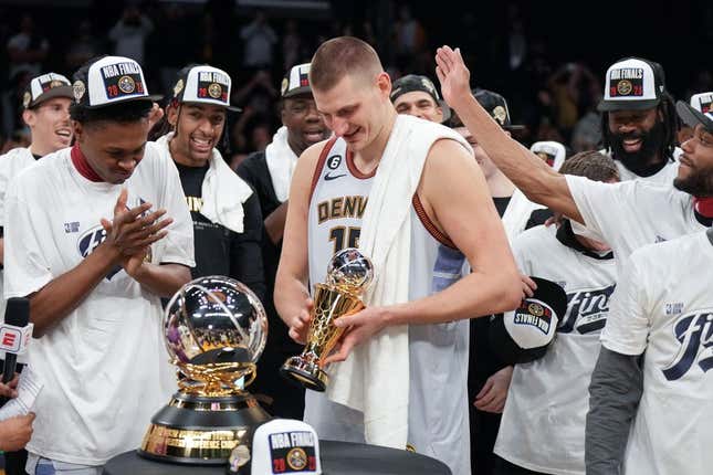 May 22, 2023; Los Angeles, California, USA; Denver Nuggets center Nikola Jokic (15) celebrates winning the Western Conference MVP Trophy and beating the Los Angeles Lakers in game four of the Western Conference Finals for the 2023 NBA playoffs at Crypto.com Arena.