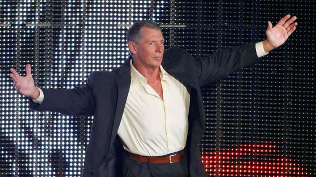 A photo shows Vince McMahon walking down the entrance ramp at a WWE Monday Night Raw show in 2009.