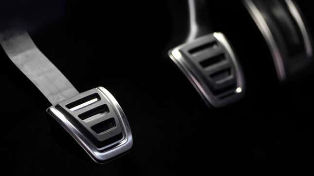 Three pedals inside a car