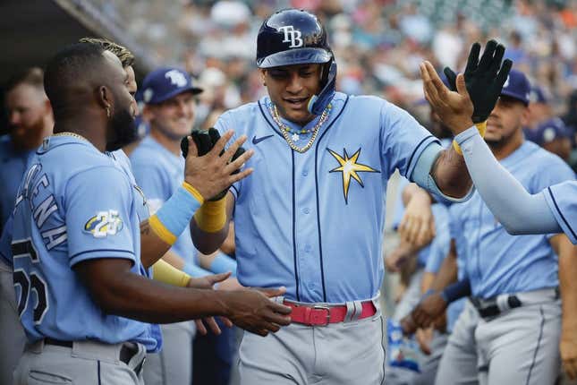 Aug 4, 2023; Detroit, Michigan, USA;  Tampa Bay Rays center fielder Jose Siri (22) is greeted after he hits a two run home run in the second inning against the Detroit Tigers at Comerica Park.