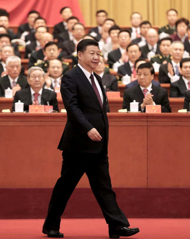 Chinese President Xi Jinping walks to the lectern to deliver his speech during the opening session of the 19th National Congress of the Communist Party of China at the Great Hall of the People in Beijing, China October 18, 2017. Picture taken October 18, 2017. China Daily via REUTERS ATTENTION EDITORS - THIS IMAGE WAS PROVIDED BY A THIRD PARTY. CHINA OUT. - RC1DF571FF00