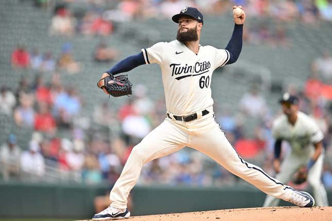 Aug 20, 2023; Minneapolis, Minnesota, USA; Minnesota Twins starting pitcher Dallas Keuchel (60) throws a pitch against the Pittsburgh Pirates during the first inning at Target Field.