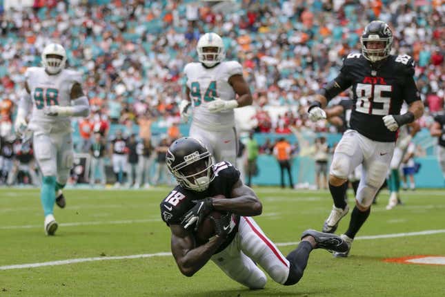 Oct 24, 2021; Miami Gardens, Florida, USA; Atlanta Falcons wide receiver Calvin Ridley (18) makes a catch in the end zone for a touchdown against the Miami Dolphins during the second quarter of the game at Hard Rock Stadium.