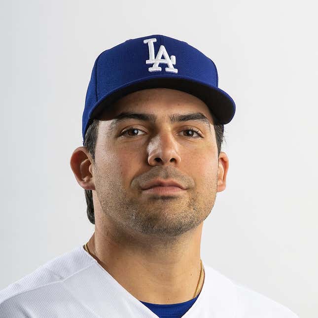 February 22, 2023;  Glendale, Arizona, USA;  Los Angeles Dodgers pitcher Tyler Cyr poses for a portrait during a photo day at Camelback Ranch.