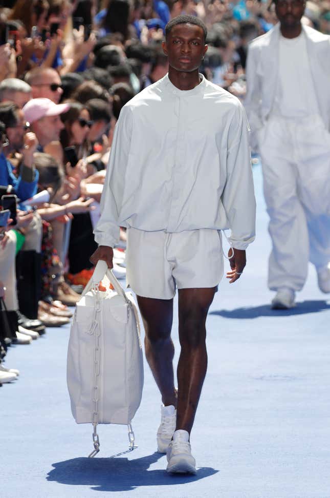 A model presents a creation by designer Virgil Abloh as part of his Spring/Summer 2019 collection for Louis Vuitton fashion house during Men's Fashion Week in Paris, France, June 21, 2018. REUTERS/Charles Platiau - RC18DC8CA330