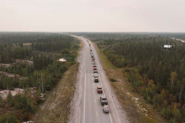 Yellowknife residents leave the city on Highway 3, the only highway in or out of the community, after an evacuation order was given due to the proximity of a wildfire in Yellowknife, Northwest Territories, Canada August 16, 2023.