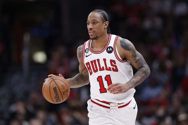 Apr 2, 2023; Chicago, Illinois, USA; Chicago Bulls forward DeMar DeRozan (11) brings the ball up court against the Memphis Grizzlies during the second half at United Center.