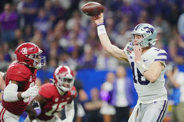 Dec 31, 2022; New Orleans, LA, USA; Kansas State Wildcats quarterback Will Howard (18) throws against the Alabama Crimson Tide during the second half in the 2022 Sugar Bowl at Caesars Superdome.