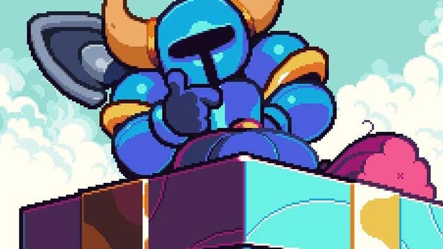 Shovel Knight stares at a gift wrapped in a gold bow. 