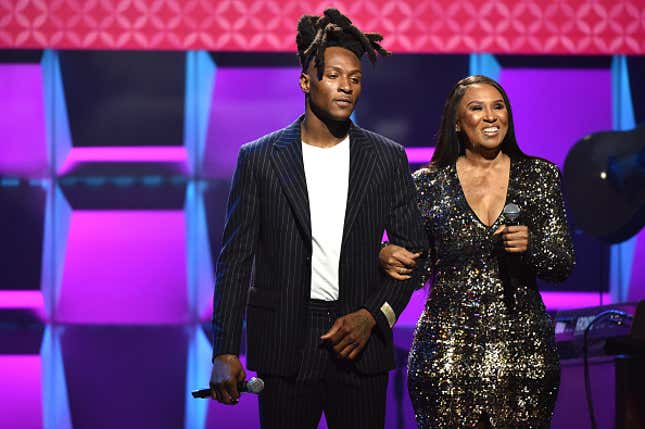 DeAndre Hopkins (L) and Sabrina Greenlee speak onstage during the BET Super Bowl Gospel Celebration at the James L. Knight Center on January 30, 2020 in Miami, Florida. 