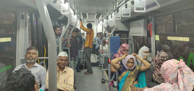 Passengers travelling in an electric bus in Pune.