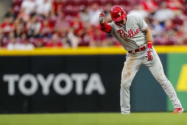 Apr 14, 2023; Cincinnati, Ohio, USA; Philadelphia Phillies second baseman Bryson Stott (5) reacts after hitting a double in the fourth inning against the Cincinnati Reds at Great American Ball Park.