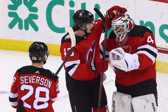 May 7, 2023; Newark, New Jersey, USA; New Jersey Devils defenseman Luke Hughes (43) and New Jersey Devils goaltender Vitek Vanecek (41) celebrate the Devils win over the Carolina Hurricanes in game three of the second round of the 2023 Stanley Cup Playoffs at Prudential Center.