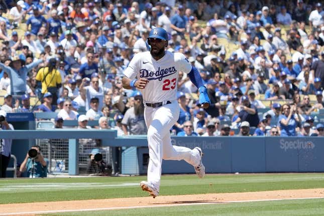 Apr 19, 2023; Los Angeles, California, USA; Los Angeles Dodgers right fielder Jason Heyward (23) scores in the fourth inning against the New York Mets at Dodger Stadium.