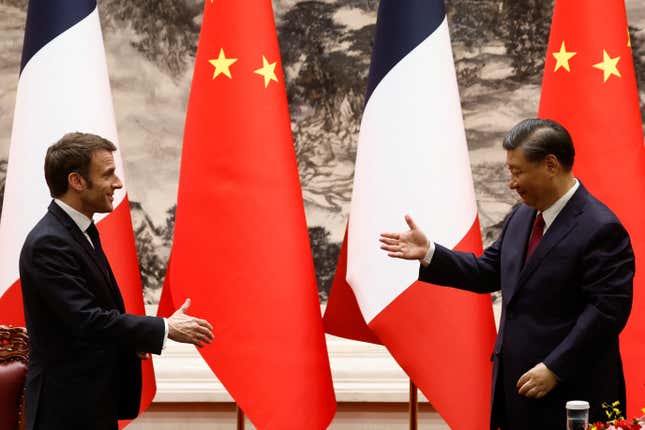 Macron’s high-profile trip to China comes as protests continue to rage across France.
