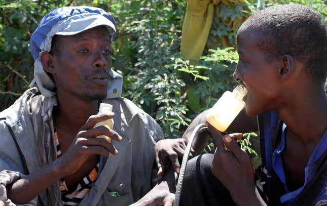 Homeless people in Somalia sniffing glue.