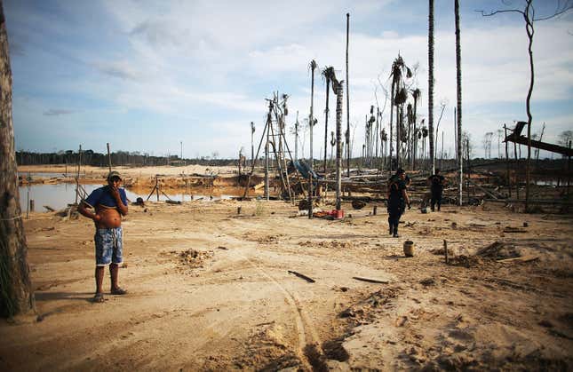 The environmental degradation caused by illegal mining practices in the Madre De Dios province of Peru.