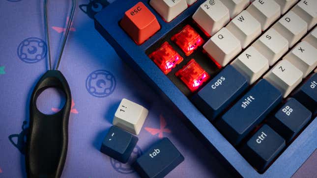 A photo of the Q1 keyboard opened up with its switches