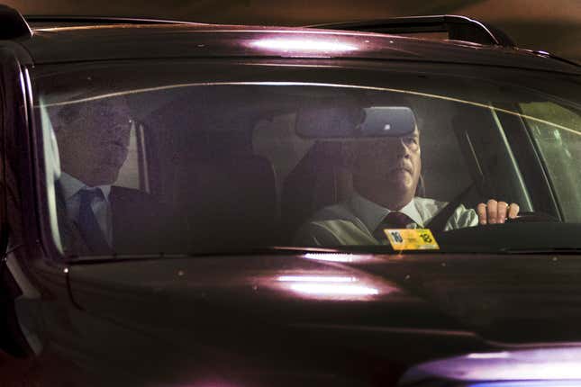 Another view of Manafort and his lawyer leaving Manafort’s home in Alexandria, Va.