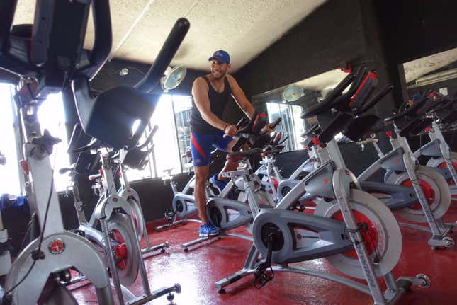 Sandro, a spinning instructor, makes a better living than most Cubans.