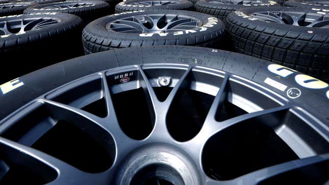 A close up photo of a stack of Goodyear tires at a Nascar event. 