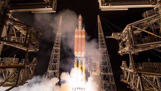 A Delta IV rocket launches from a pad in Florida. 