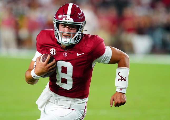 Sep 2, 2023; Tuscaloosa, Alabama, USA; Alabama Crimson Tide quarterback Tyler Buchner (8) scrambles up the field against the Middle Tennessee Blue Raiders during the second half at Bryant-Denny Stadium.