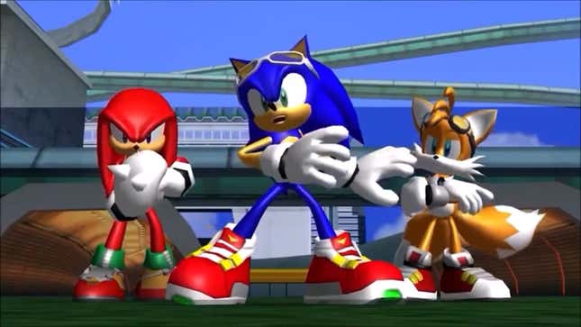 Sonic, Knucles, and Tails look on in bewilderment at Dr. Eggman's announcement