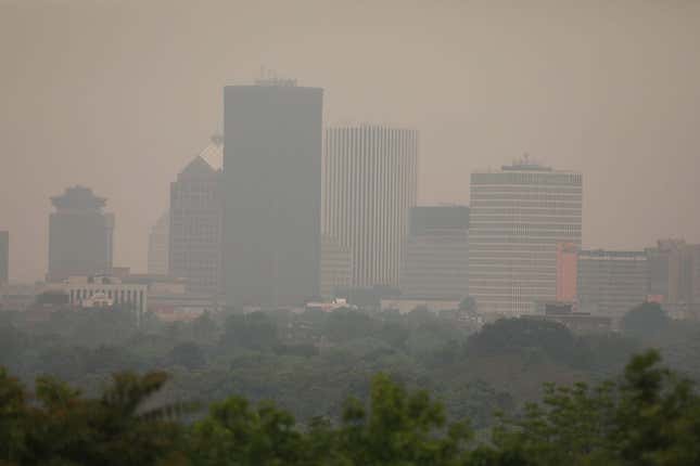 Smog from the wildfires in Canada have been making their way across the upper United States. The smog obscures some of the Rochester skyline that is normally clearly scene at Cobb Hills Park.