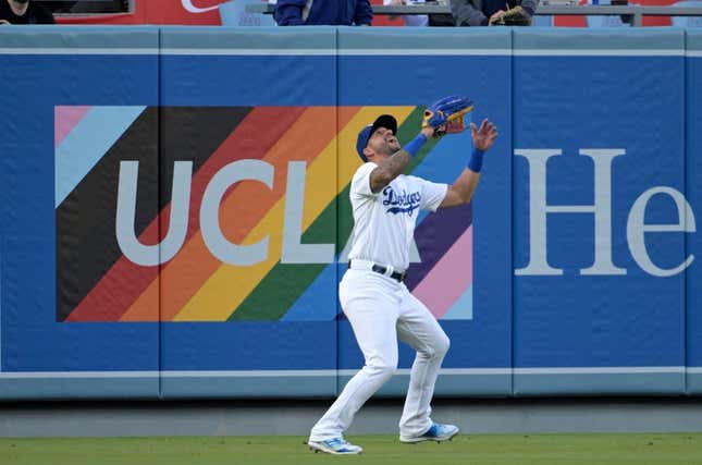 June 16, 2023;  Los Angeles, California, USA;  Los Angeles Dodgers left fielder David Peralta (6) catches for the out in the first inning against the San Francisco Giants at Dodger Stadium.