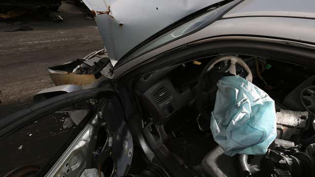 A deployed airbag is seen in a 2001 Honda Accord at the LKQ Pick Your Part salvage yard on May 22, 2015 in Medley, Florida
