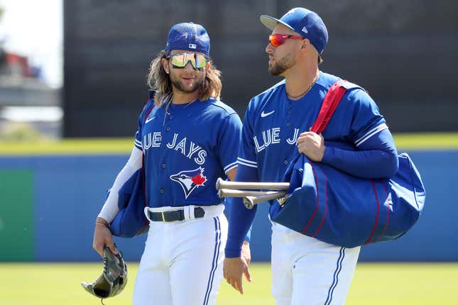 The Blue Jays are lucky to have vaccinated players like Bo Bichette (left) and George Springer.
