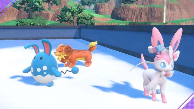 An Azumarill, Dachsbun, and Sylveon are gathered together on a rooftop.
