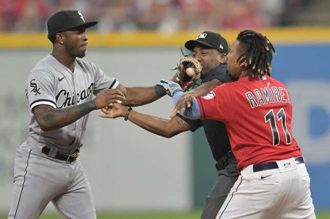 Aug 5, 2023; Cleveland, Ohio, USA; Umpire Malachi Moore tries to separate Cleveland Guardians third baseman Jose Ramirez (11) and Chicago White Sox shortstop Tim Anderson (7) after Ramirez slid into second with an RBI double during the sixth inning at Progressive Field.