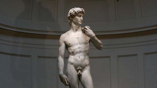 Michelangelo's statue of David in a gallery