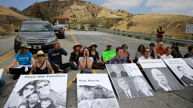 People chant slogans during a protest outside the Aliso Canyon storage facility, in the Porter Ranch section of Los Angeles, May 2016. 