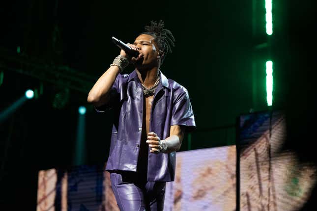  Rapper Lil Baby performs onstage at The Kia Forum on August 26, 2022 in Inglewood, California. 