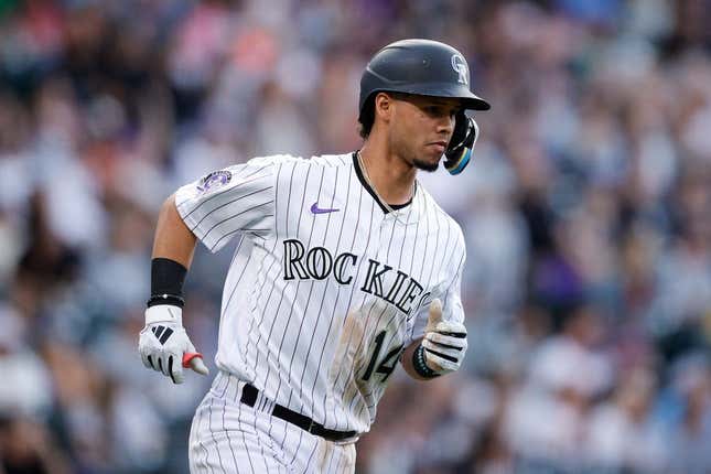 Jun 30, 2023; Denver, Colorado, USA; Colorado Rockies shortstop Ezequiel Tovar (14) rounds the bases on a three run home run in the sixth inning against the Detroit Tigers at Coors Field.